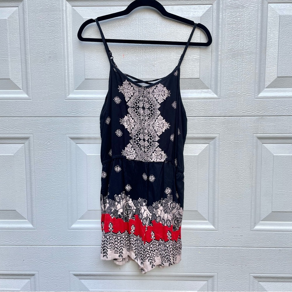 Angie woman’s romper black red and beige print. Pockets!! Adjustable straps